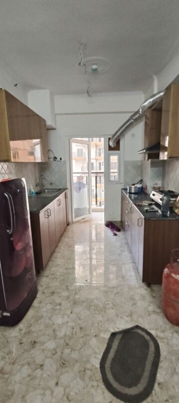 Kitchen in 3 BHK Apartment at Amrapali Terrace Homes, Tech Zone 4 Greater Noida – for Rent