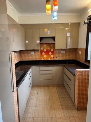 Kitchen in 3 BHK Apartment at Karamyogi Apartments, Sector 10a – for Sale