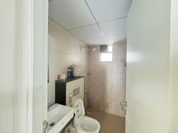 Bathroom in 2 BHK Apartment at Godrej Green Vistas, Mahalunge – for Rent