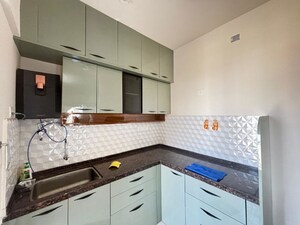 Kitchen in 2 BHK Apartment at Godrej Green Vistas, Mahalunge – for Rent