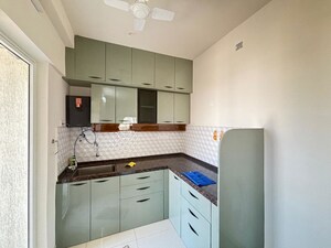 Kitchen in 2 BHK Apartment at Godrej Green Vistas, Mahalunge – for Rent