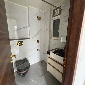Bathroom in 3 BHK Apartment at Smart World Orchard, Sector 61 – for Rent