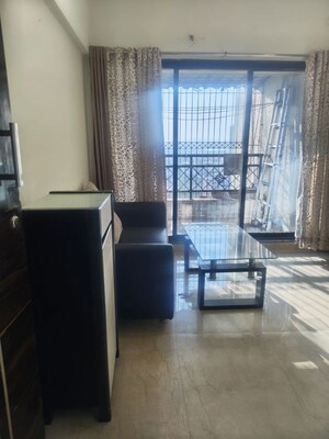 Living Room in 2 BHK Apartment at Tulsi Aura Mumbai, Ghansoli – for Rent