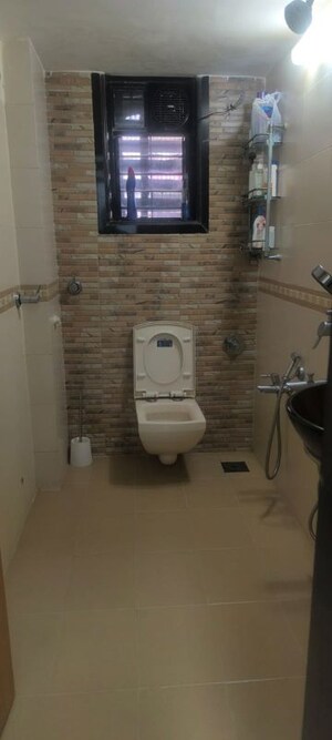 Bathroom in 2 BHK Apartment at Kumar Harshvardhan CHS, Andheri West – for Rent