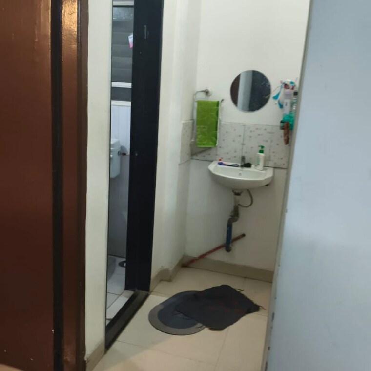 Bathroom, punyai-apartment 1 Bedroom 670 Sq.Ft. Apartment In Ganesh Nagar Pune 9816596