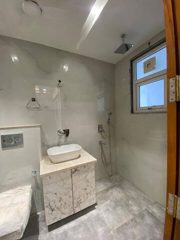 Bathroom in 4 BHK Builder Floor at Sushant Lok I – for Rent