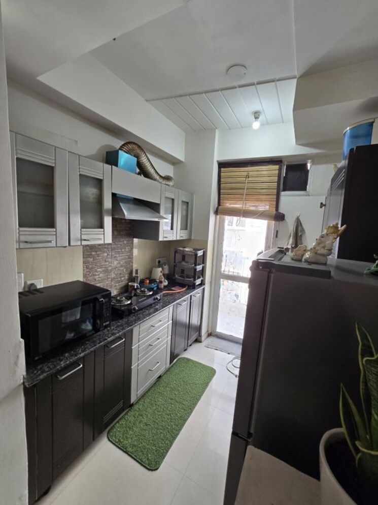 Kitchen, amrapali-silicon-city 2.5 Bedroom 1180 Sq.Ft. Apartment In Sector 76 Noida 9816732