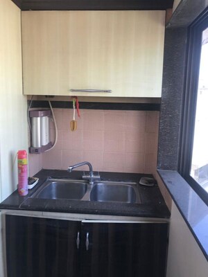 Kitchen in 2.5 BHK Apartment at Monalisa Apartments Cumbala Hill, Breach Candy – for Rent