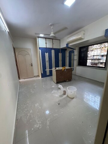 Room in 2 BHK Apartment at Concord CHS, Andheri West – for Rent