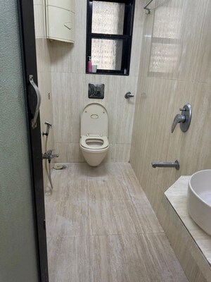 Bathroom in 2 BHK Apartment at Concord CHS, Andheri West – for Rent