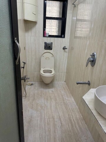 Bathroom in 2 BHK Apartment at Concord CHS, Andheri West – for Rent
