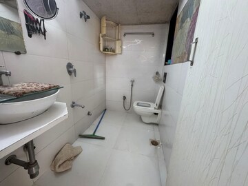 Bathroom in 2 BHK Apartment at Concord CHS, Andheri West – for Rent