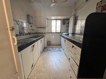 Kitchen in 2 BHK Apartment at Concord CHS, Andheri West – for Rent