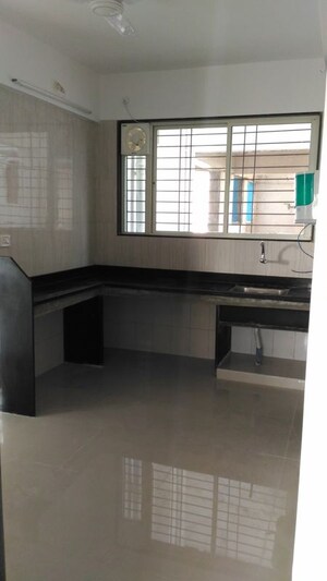 Kitchen in 2 BHK Apartment at Dreams Wisteria, Pisoli – for Rent