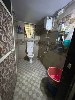 Bathroom in 2 BHK Apartment at Om Saidham CHS, Kalyan East – for Rent