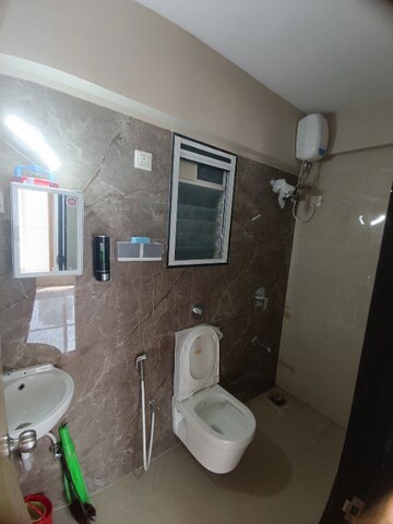 Bathroom in 1 BHK Apartment at Haware Intelligentia Axis, Borivali East – for Rent