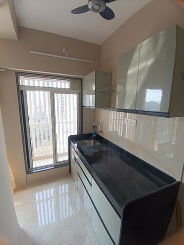 Kitchen in 1 BHK Apartment at Haware Intelligentia Axis, Borivali East – for Rent