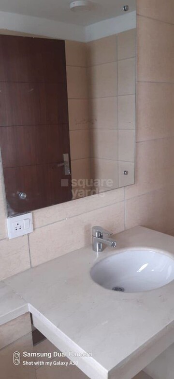 Bathroom in 4 BHK Apartment at Puri Diplomatic Greens Phase I, Sector 111 – for Rent