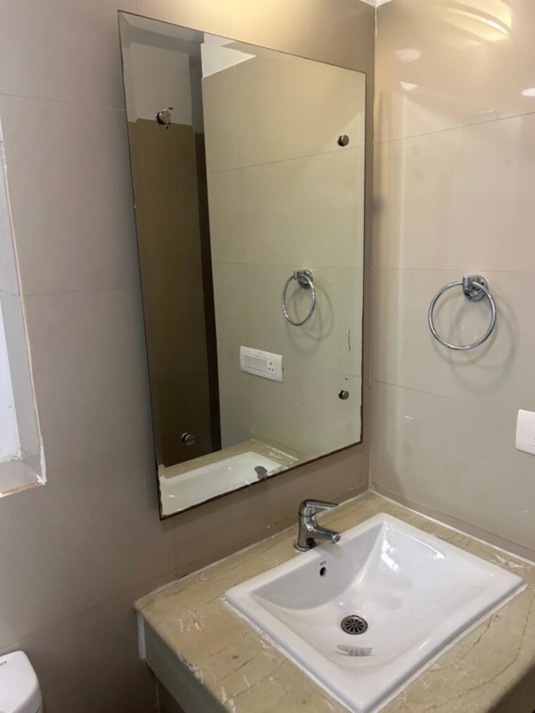 Bathroom, emaar-the-palm-drive-palm-studios 2 Bedroom 1200 Sq.Ft. Apartment In Sector 66 Gurgaon 9818035