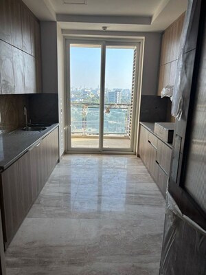 Kitchen in 4 BHK Apartment at Ambience Creacions, Sector 22 – for Rent