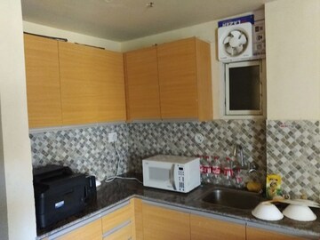 Kitchen in 1 RK Apartment at Supertech Czar Suites, Omicron I Greater Noida – for Rent