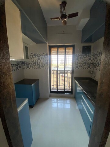Kitchen in 1 BHK Apartment at Raunak Unnathi Woods Phase 7 A And B, Ghodbunder Road – for Rent