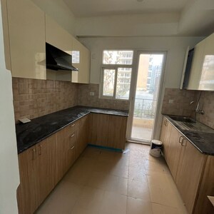 Kitchen in 4 BHK Apartment at Amrapali Crystal Homes, Sector 76 – for Rent