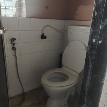 Bathroom in 1 BHK Apartment at Janki Ram CHS, Goregaon West – for Rent
