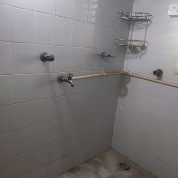 Bathroom in 1 BHK Apartment at Janki Ram CHS, Goregaon West – for Rent