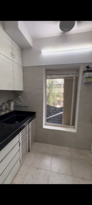 Kitchen in 2 BHK Apartment at Kamdhenu Apan Ghar CHS, Andheri West – for Sale