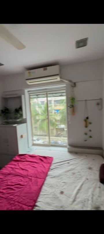 Bedroom in 2 BHK Apartment at Kamdhenu Apan Ghar CHS, Andheri West – for Sale