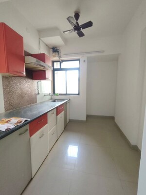 Kitchen in 2 BHK Apartment at Puranik Hometown, Ghodbunder Road – for Rent