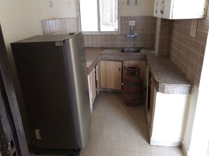 Living Room in Studio Apartment at Supertech Czar Suites, Omicron I Greater Noida – for Sale