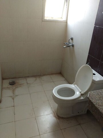 Bathroom in Studio Apartment at Supertech Czar Suites, Omicron I Greater Noida – for Sale