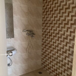 Bathroom in 2 BHK Apartment at Gaur Yamuna City 16th Park View, Sector 19 Yamuna Expressway – for Rent