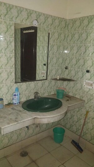 Bathroom in 2 BHK Apartment at RWA Apartments, Sector 31 – for Rent