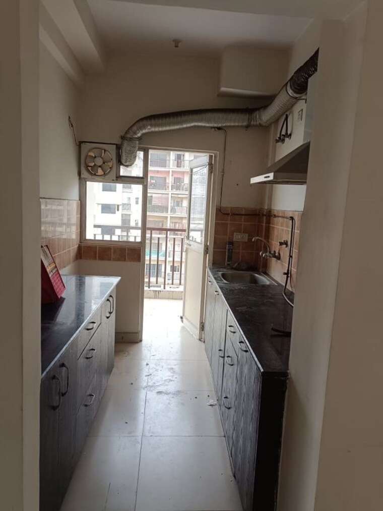 Kitchen, aims-golf-avenue-ii 2 Bedroom 930 Sq.Ft. Apartment In Sector 75 Noida 9818713