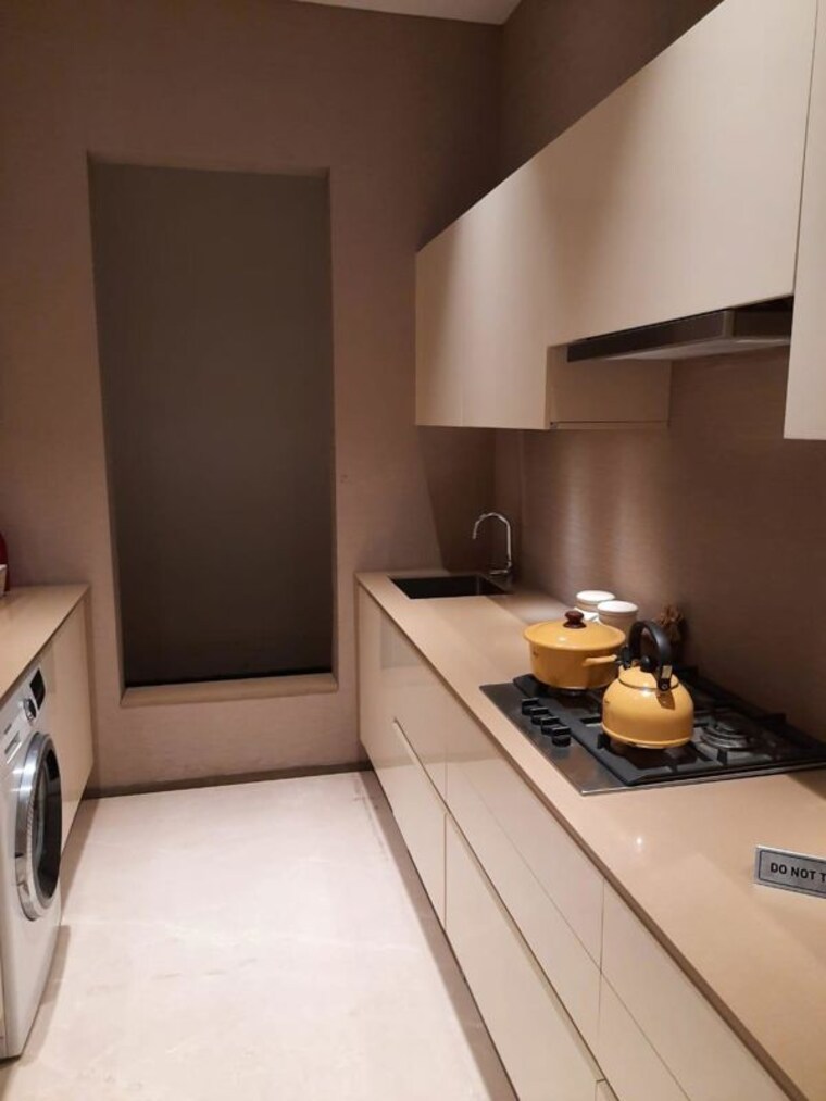 Living Room, dev-leo-tower 2 Bedroom 640 Sq.Ft. Apartment In Oshiwara Mumbai 9819088