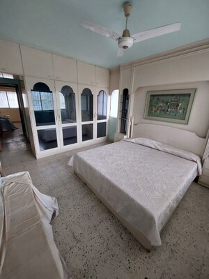 Bedroom in 3 BHK Apartment at Kumar Platinum, Camp – for Sale