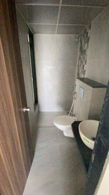 Bathroom in 2 BHK Apartment at Laxmi Shrushti Apartment, Goregaon West – for Rent