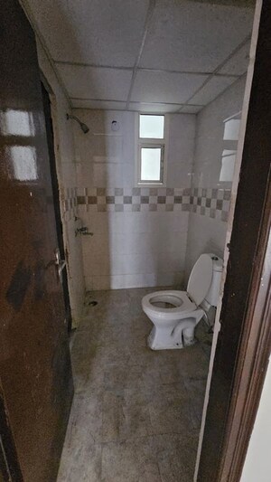 Bathroom in 2 BHK Apartment at Milan Earth, Raj Nagar Extension – for Sale