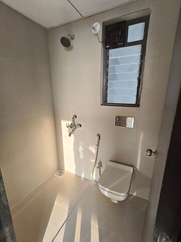 Bathroom in 1.5 BHK Apartment at Runwal My City Codename Walk, Dombivli East – for Rent