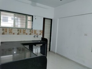 Kitchen in 1.5 BHK Apartment at Goel Ganga Aashiyana, Thergaon – for Rent