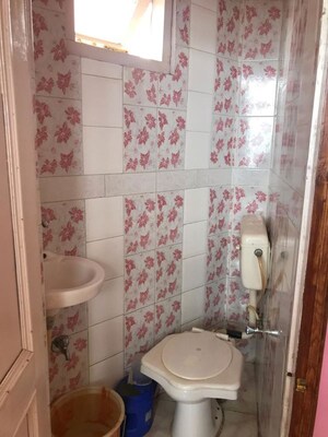Bathroom in 4 BHK Builder Floor at Mehli – for Sale