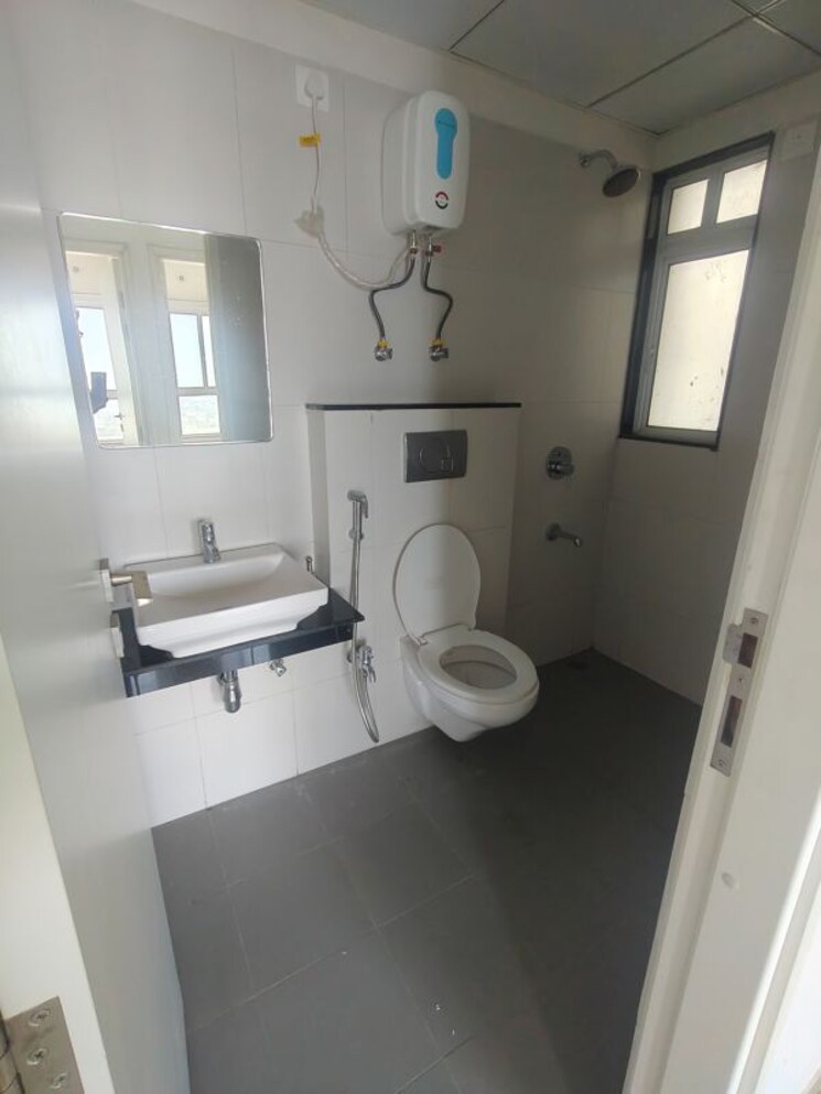 Bathroom, godrej-greens 2 Bedroom 613 Sq.Ft. Apartment In Undri Pune 9819345