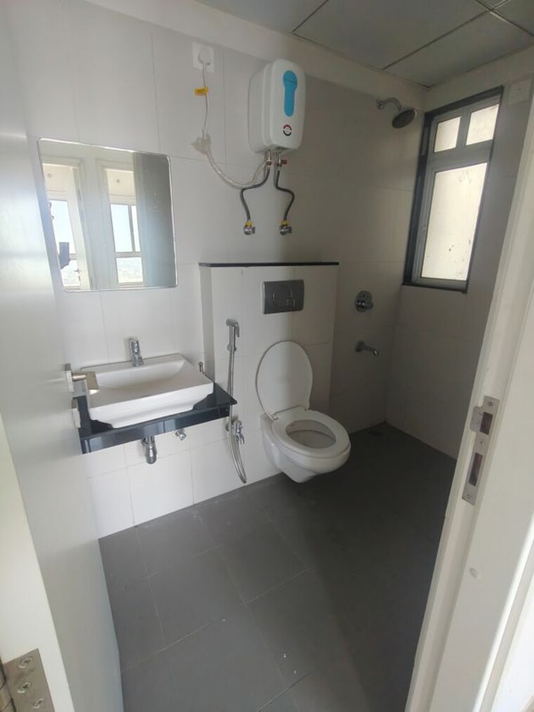 Bathroom, godrej-greens 2 Bedroom 613 Sq.Ft. Apartment In Undri Pune 9819345