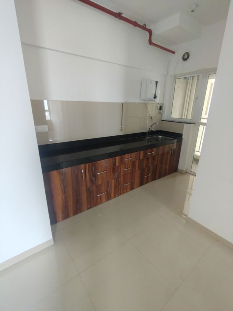 Kitchen, godrej-greens 2 Bedroom 613 Sq.Ft. Apartment In Undri Pune 9819345
