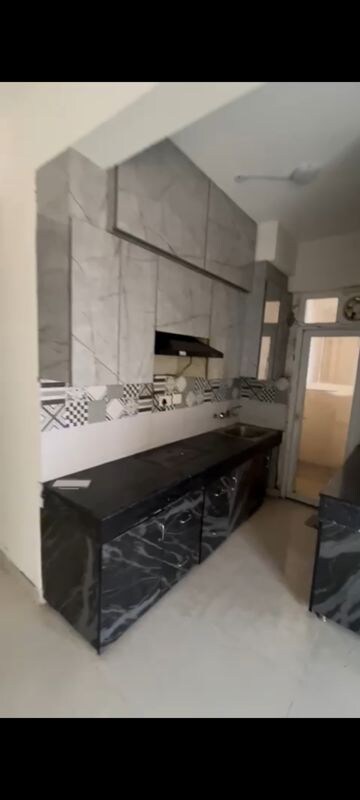 Kitchen in 2 BHK Apartment at Signature The Serenas, Sohna Sector 36 – for Rent