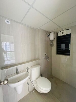Bathroom in 2 BHK Apartment at Runwal Gardens Phase 3, Dombivli East – for Rent
