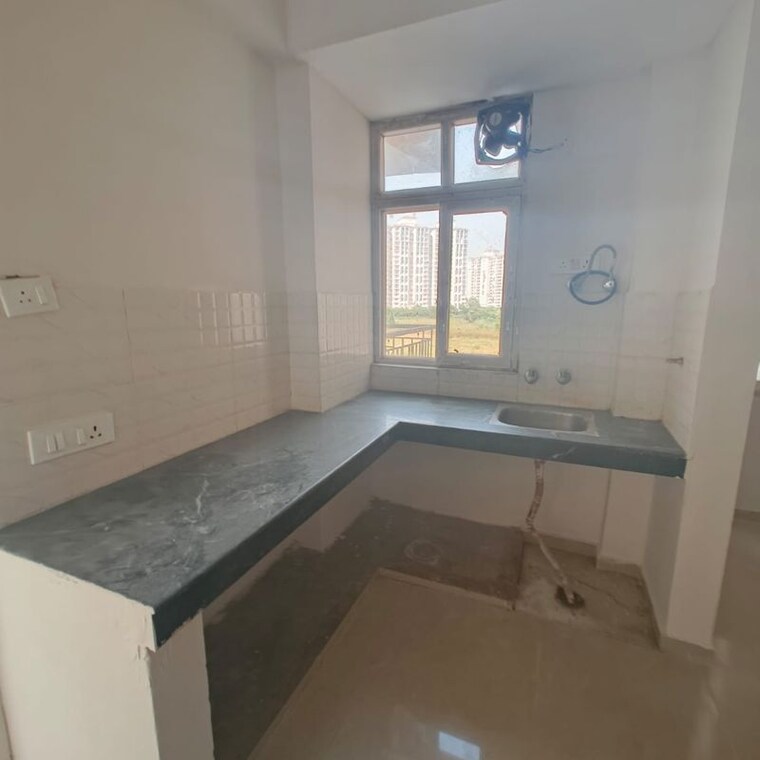 Kitchen, shree-vardhman-green-court 2 Bedroom 526 Sq.Ft. Apartment In Sector 90 Gurgaon 9819486